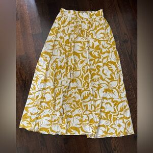 Madewell long skirt mustard yellow and white flower and leaf pattern.